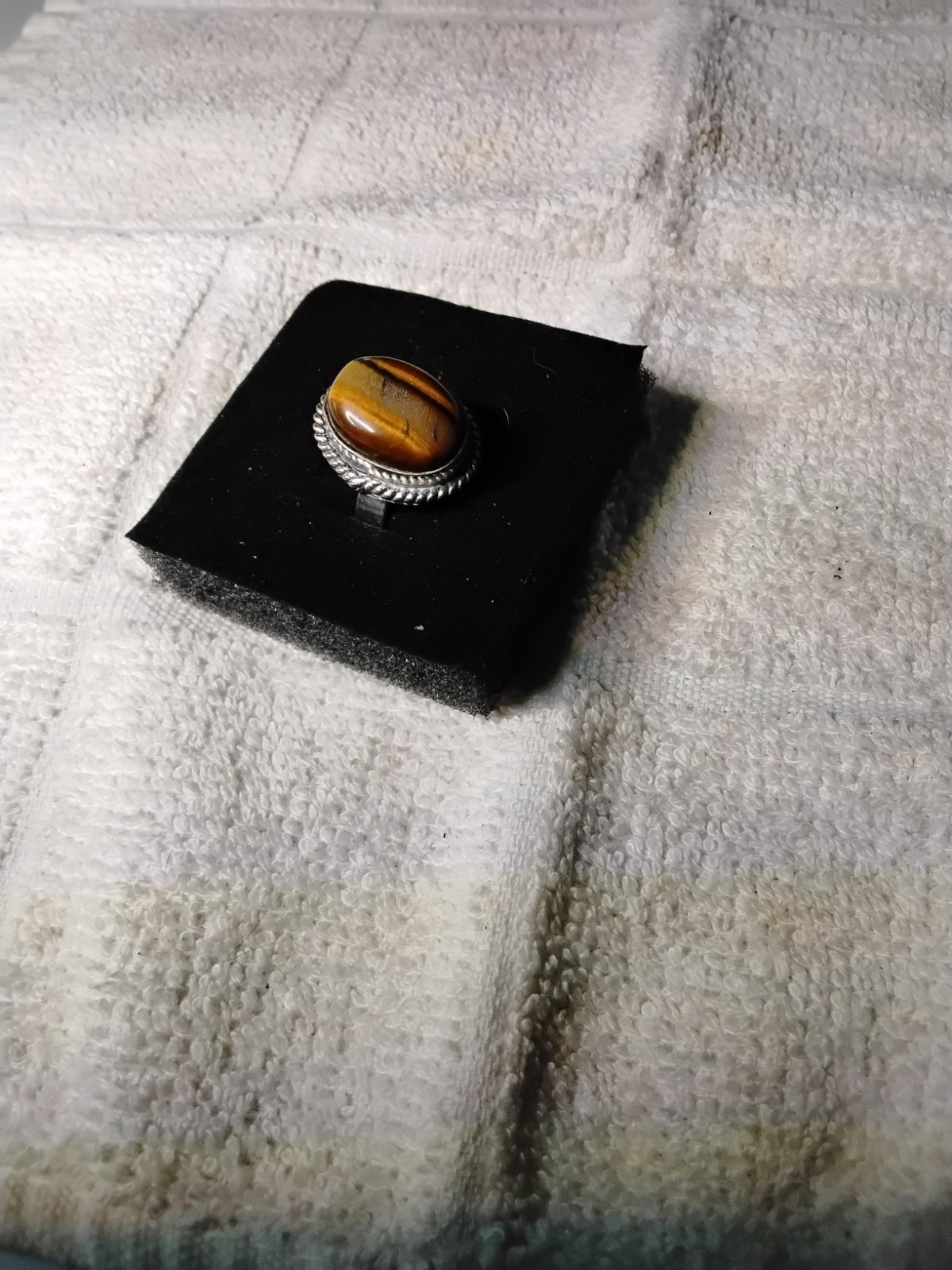 Tiger's Eye Oval Ring Bezel Set In Rhodium Plated Setting. Size 7
