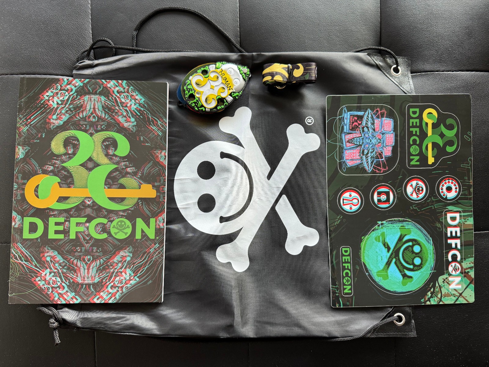 DEFCON 33 Badge Book Stickers Bag