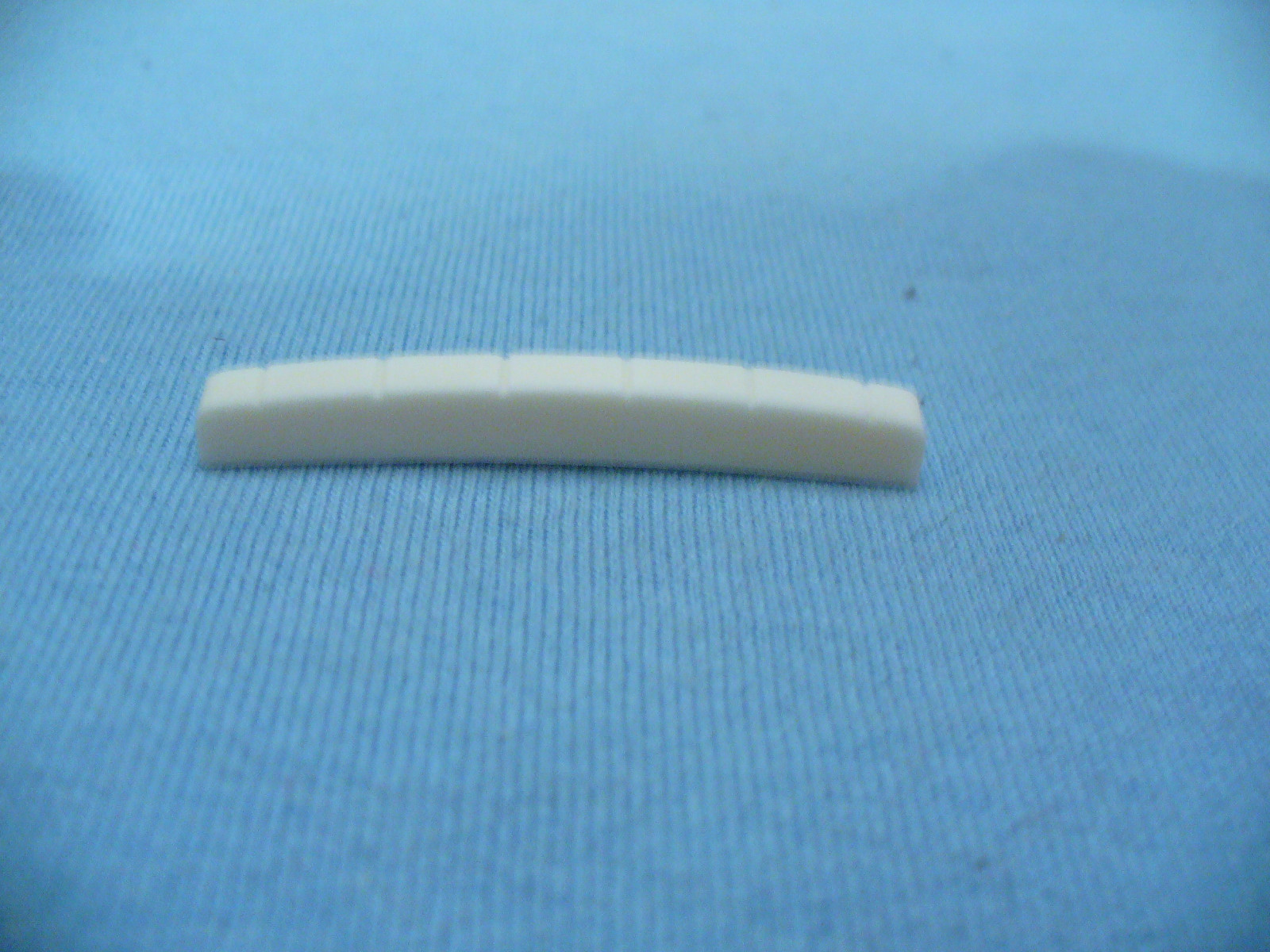 BONE SLOTTED CURVED BOTTOM SADDLE NUT FOR ST TYPE GUITAR NECK USA SHIPPING !!