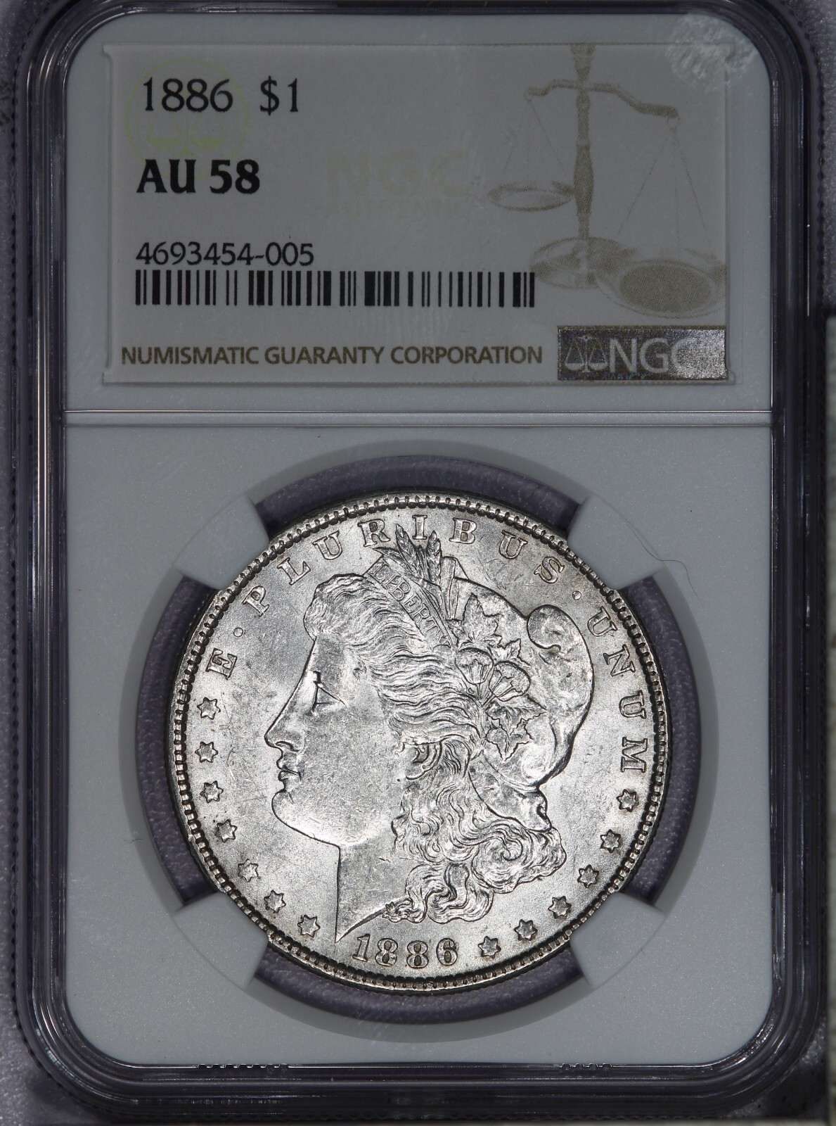 1886 Morgan Silver Dollar $1 NGC AU58 - Lustrous and flashy!