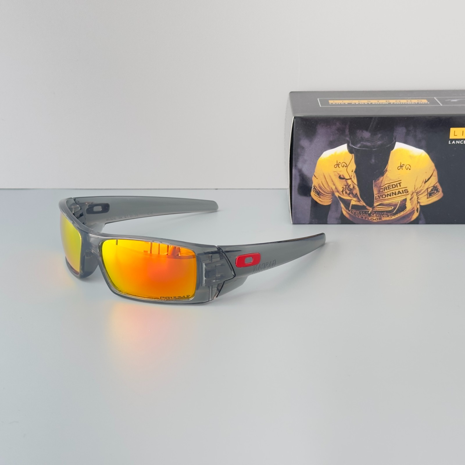 Oakley Gascan OO9014 Polarized Sunglasses Gray transparent frame with red lenses