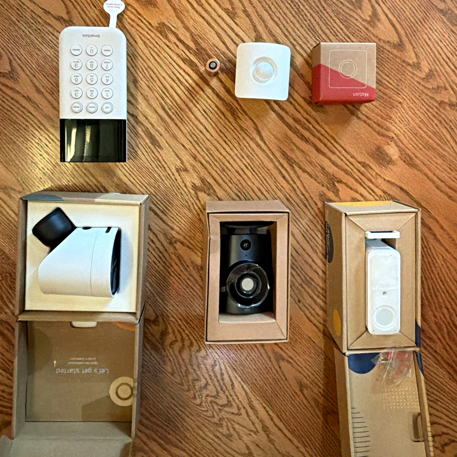 SimpliSafe items: keypad, 1 exterior &  2 interior cameras, 2 motion detectors