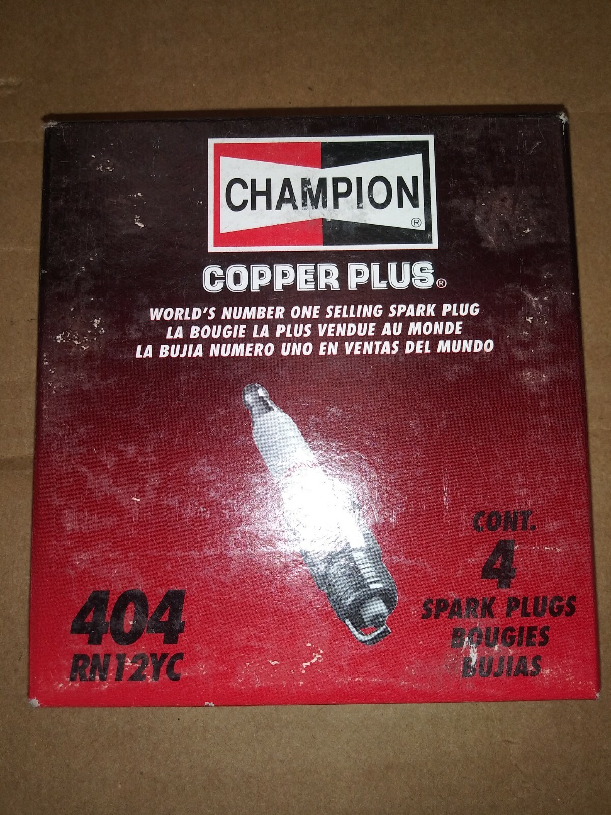 ONE GENUINE PACK CHAMPION COPPER PLUS 4 SPARK PLUGS 404 / RN12YC