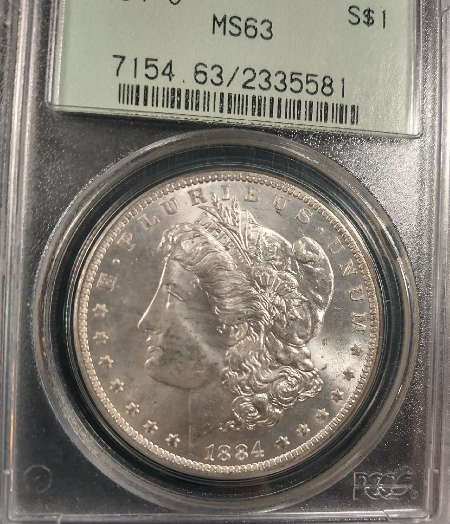 1884-O MORGAN SILVER DOLLAR - PCGS MS63