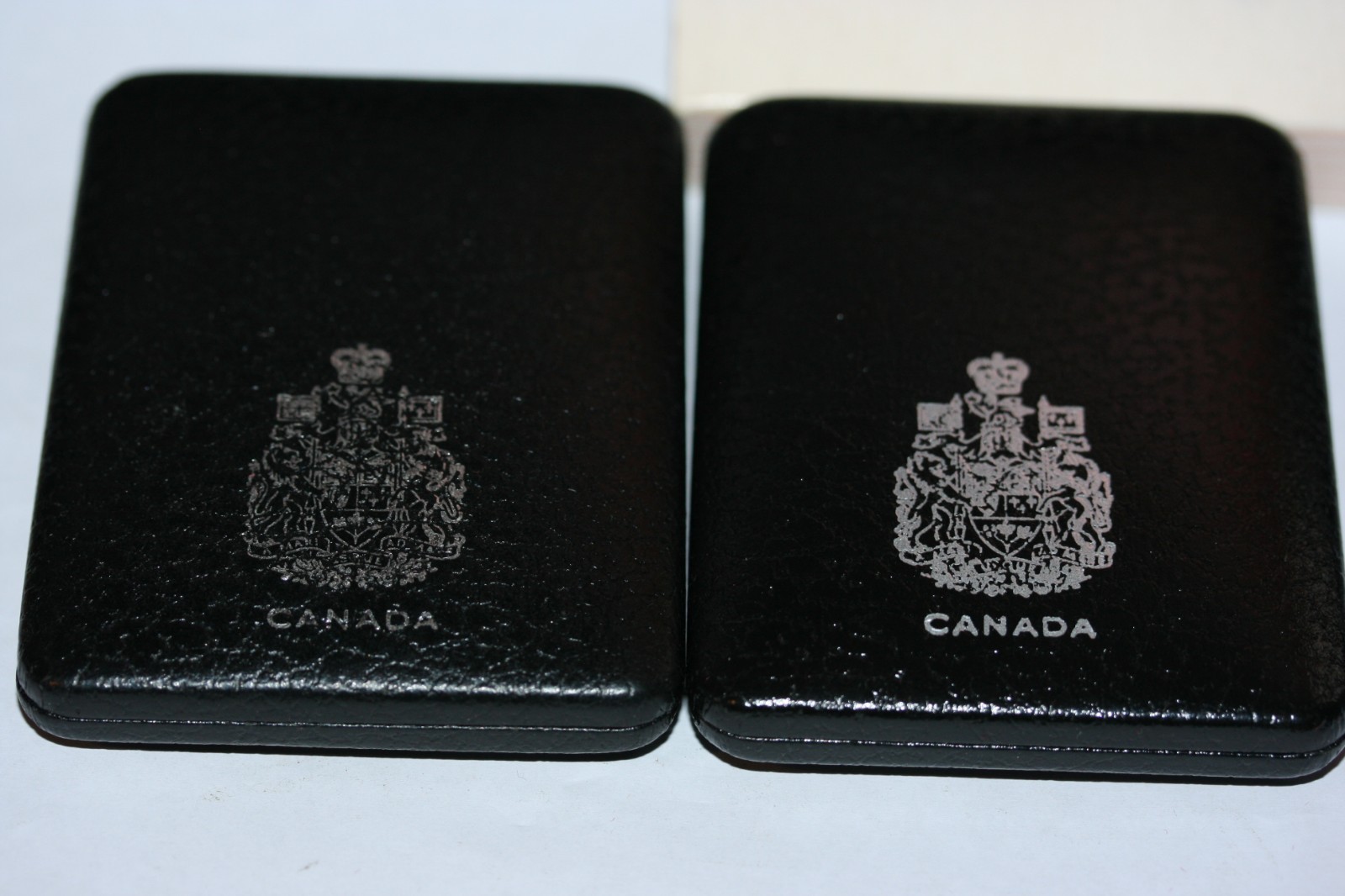 TWO Canadian dollars - original box - 0.500 silver - 1974 & 1978