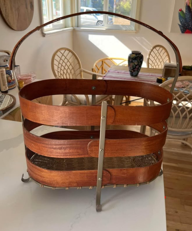 Unique metal and wood basket. 20”x17”.