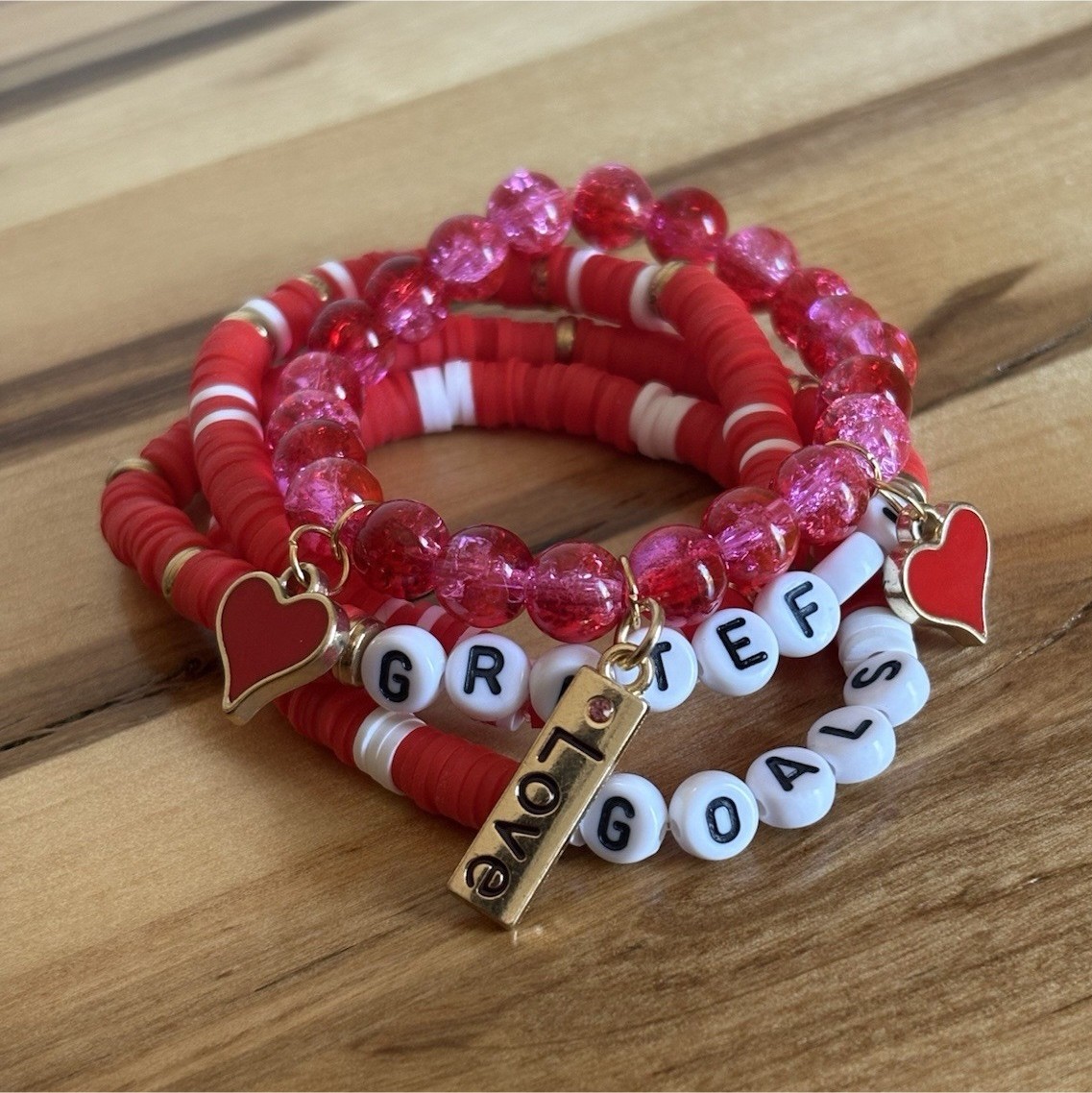 Elegant red and pink bracelets. Comes with free surprise bracelet. ￼