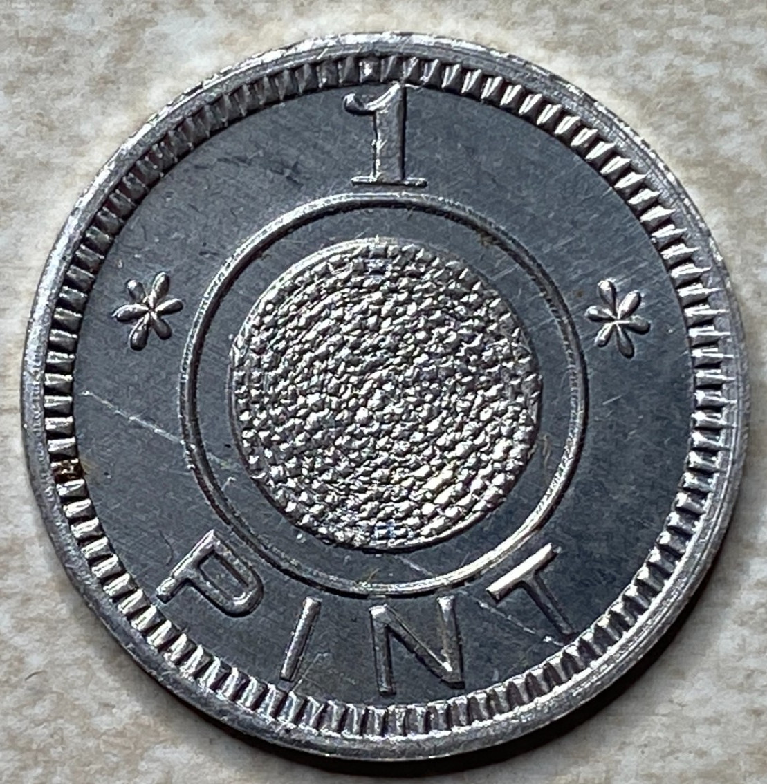 T9250 1 Pint, Unknown  Anillo Restrike Arcade Token