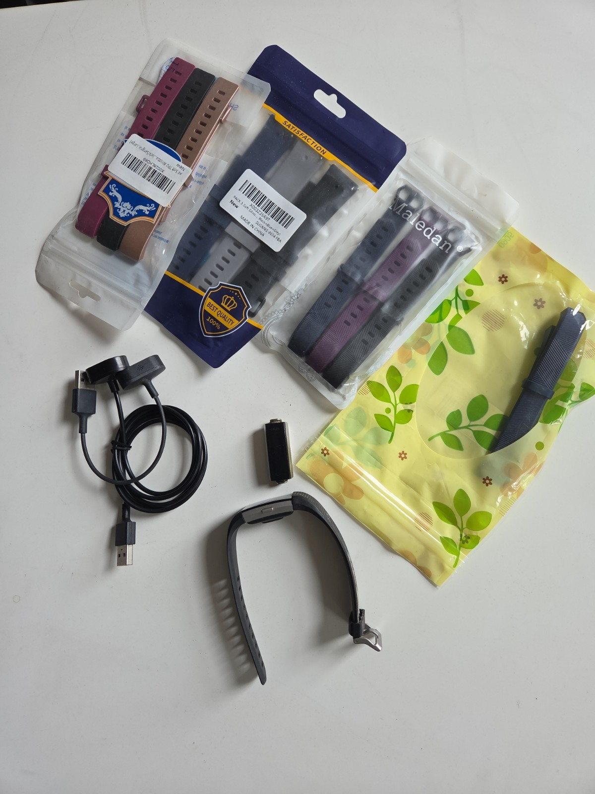 Lot Of FITBIT Faces, Chargers, And Bands