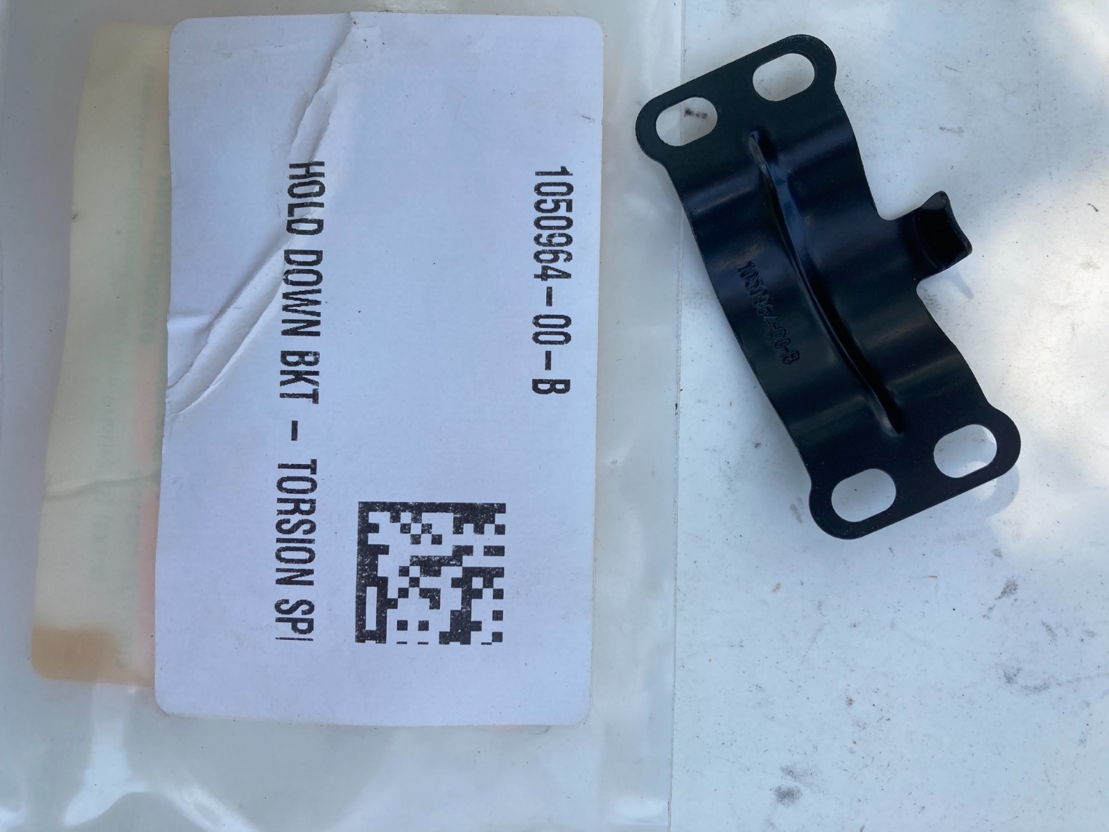 TESLA MODEL X Rear DOOR Hold Down Bracket Torsion Spring  1050964-00-B