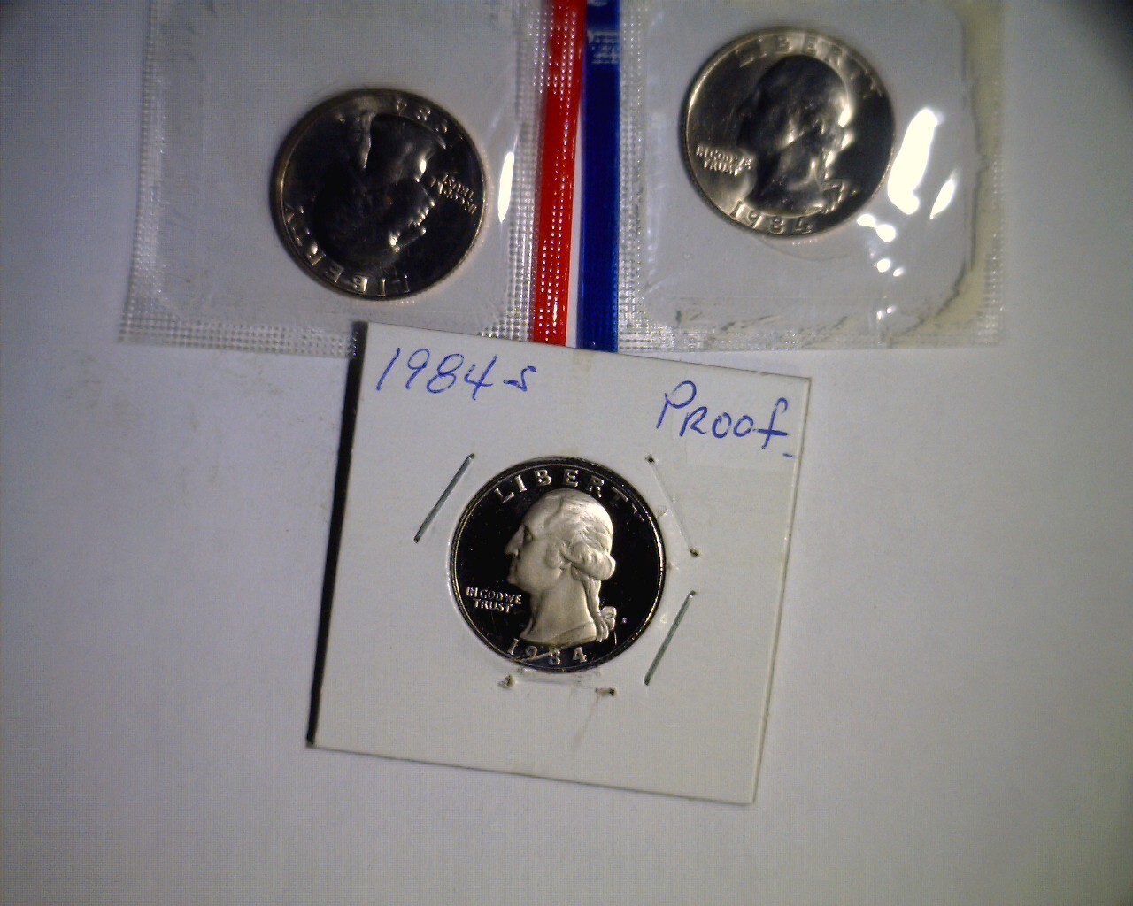1984 PDS Washington Quarters Unc in mint cello and Proof
