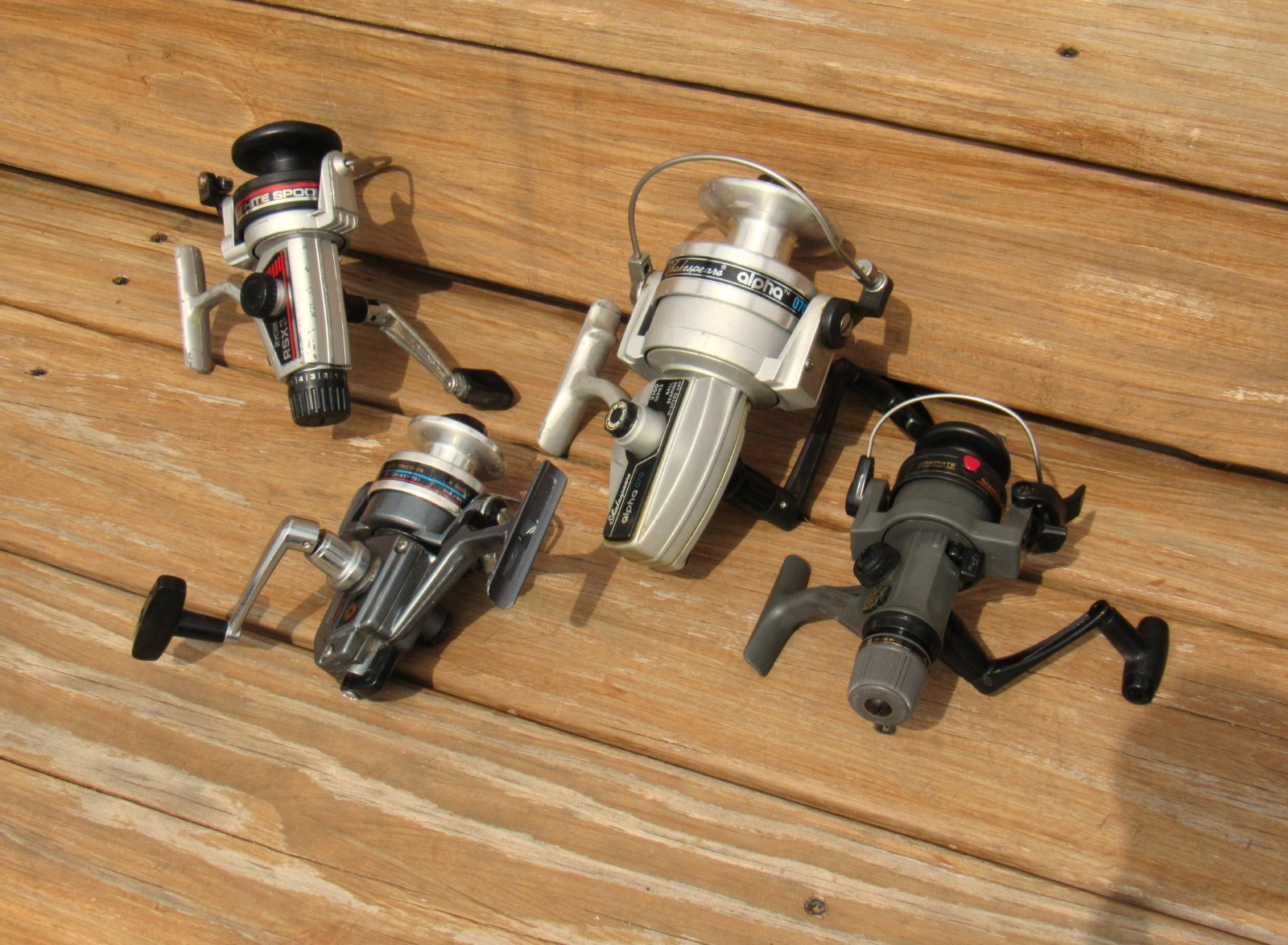 Lot  of 4 Spinning Fishing Reels  Ryobi,  Shakespeare,  Daiwa,  Shimano