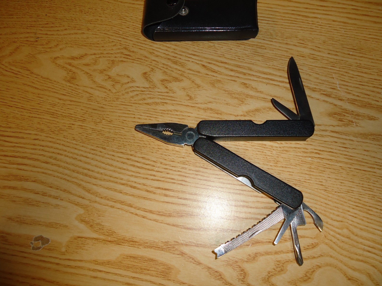 12-in-1 Multitool Black Stainless Steel / Self-locking Foldable w/ Sheath