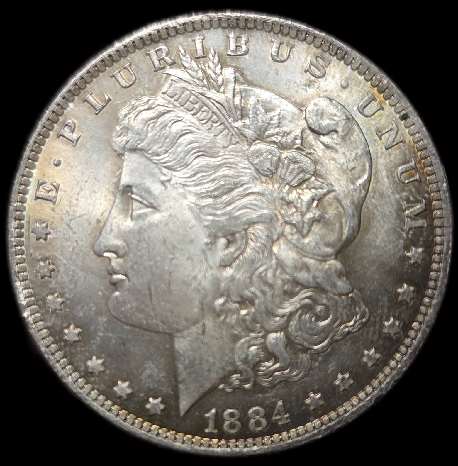 1884-O Morgan Dollar 1.00. Choice BU. Attractive Tone .77oz ASW