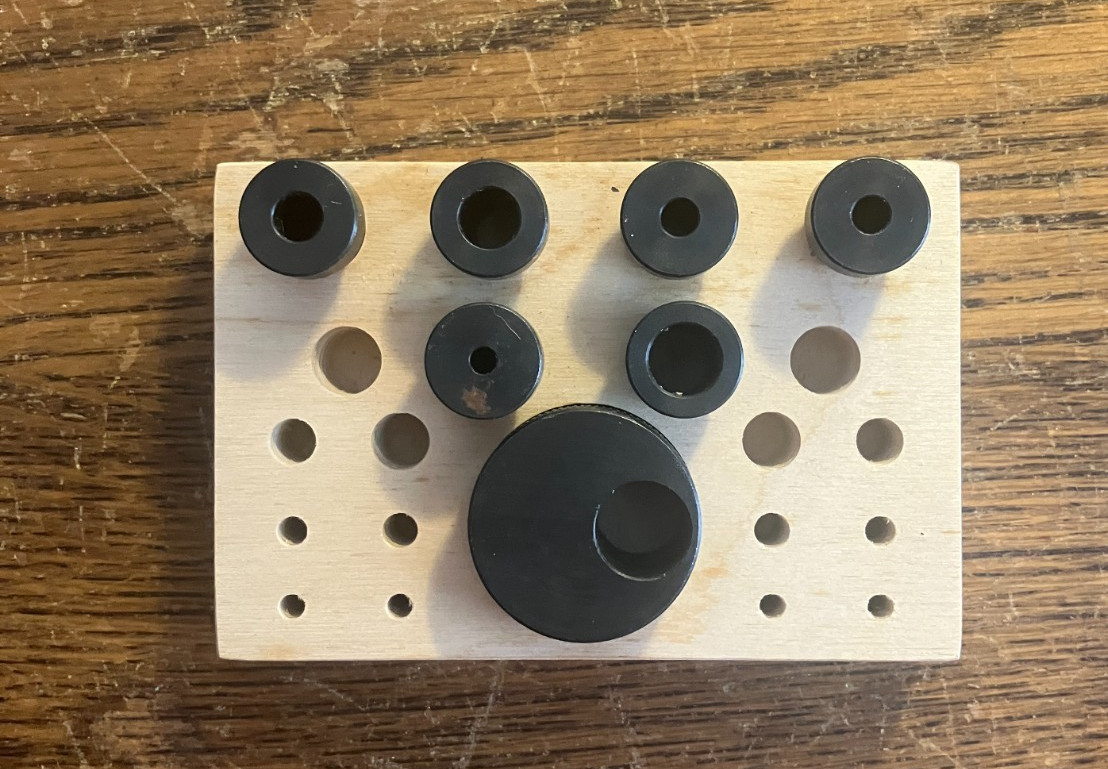 unbranded near mint blind hole spotter set in wood holder