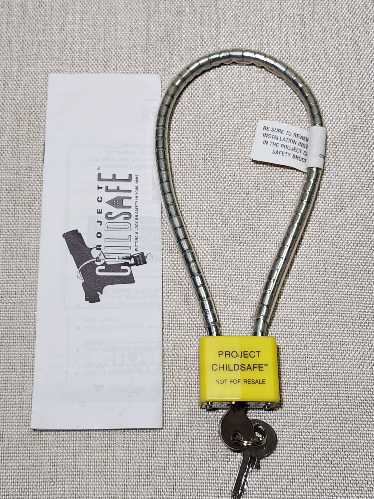 GUN LOCK CABLE BY PROJECT CHILD SAFE PISTOL RIFLE REVOLVER SIMI AUTO