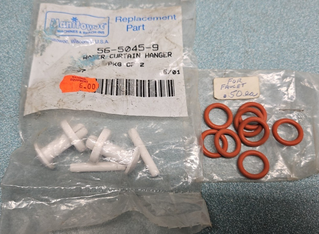 Assorted Manitowoc Ice machine parts.