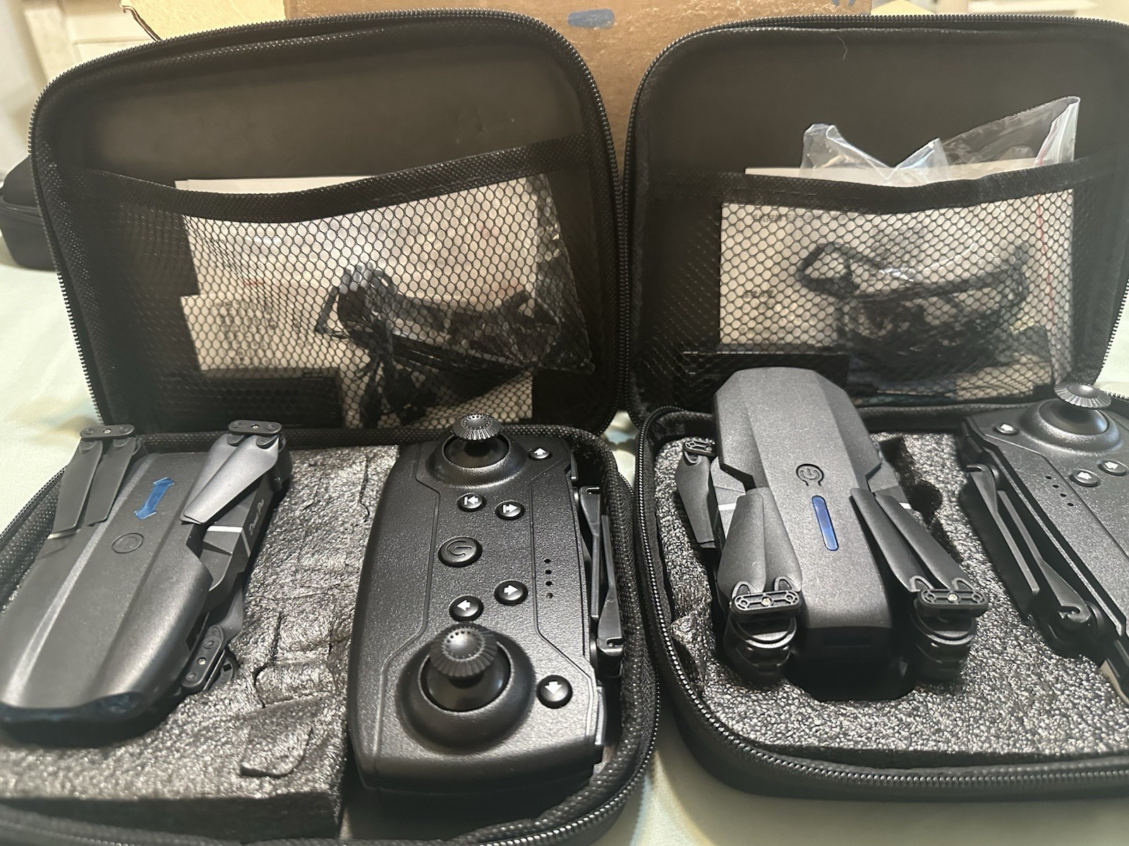 2 Foldable Toy Grade RC Quadcopter Drone Set, Remote Controllers, Batteries Case