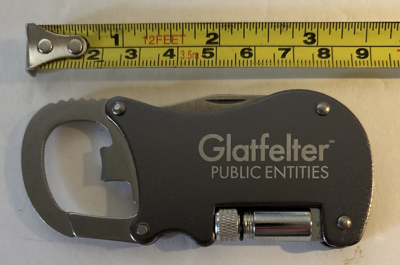 4 In 1 GLATFELTER Multitool Keychain. Carabiner Opener, Knife And Light.