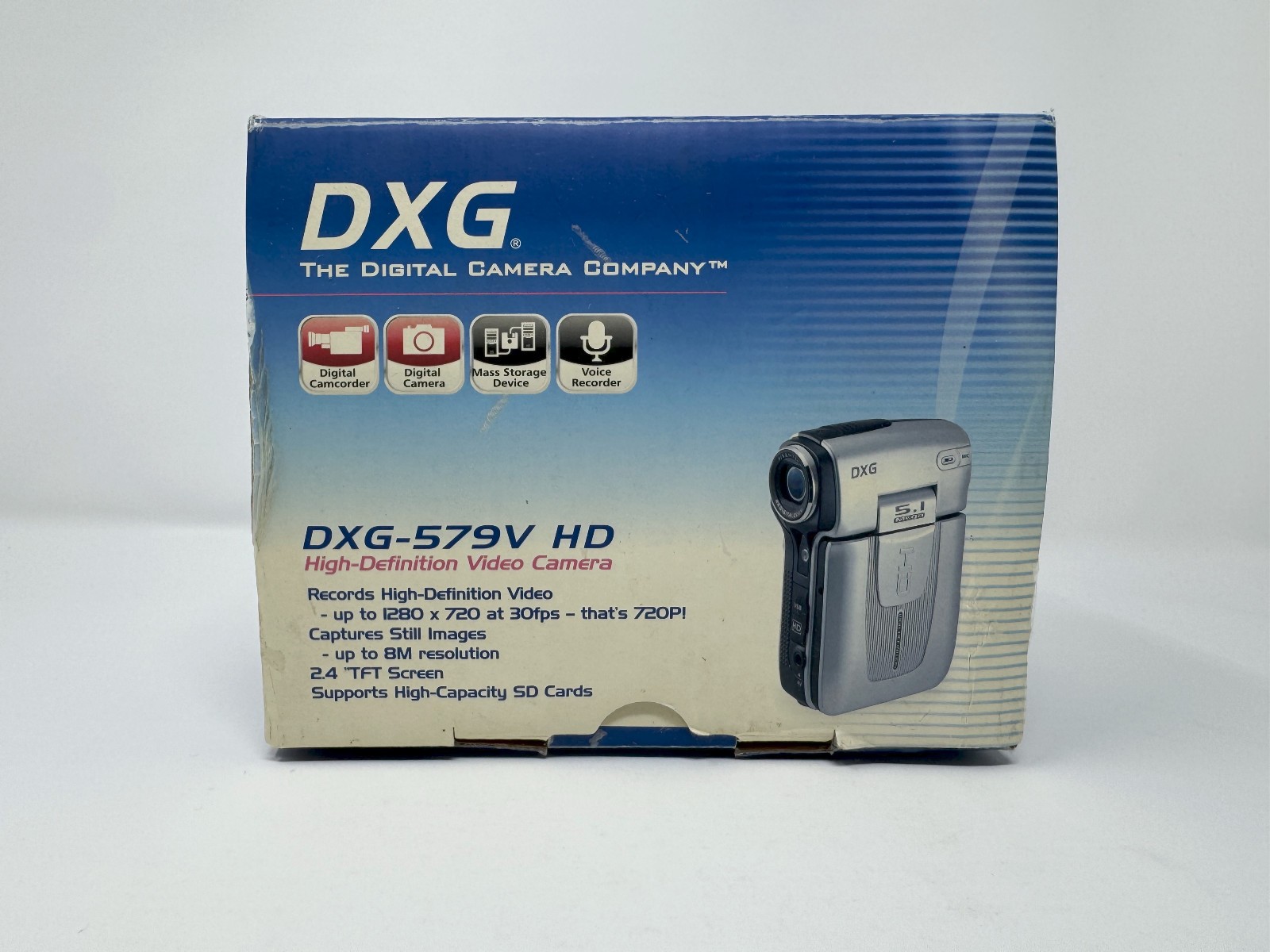 Digital Camera DXG-579V HD Silver Video Camera 8.0 Mega Pixel, 4x Zoom, Tripod