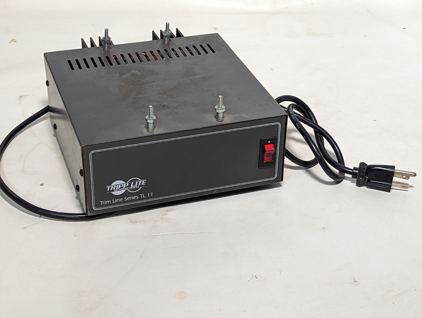 Tripp-Lite Trim Line Series TL 11 power supply, 13.8VDC out, 120VDC in