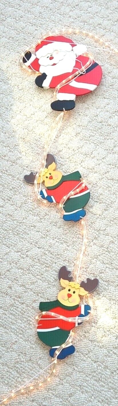 CLIMBING SANTA AND HIS REINDEERS  ON ROPE LIGHT