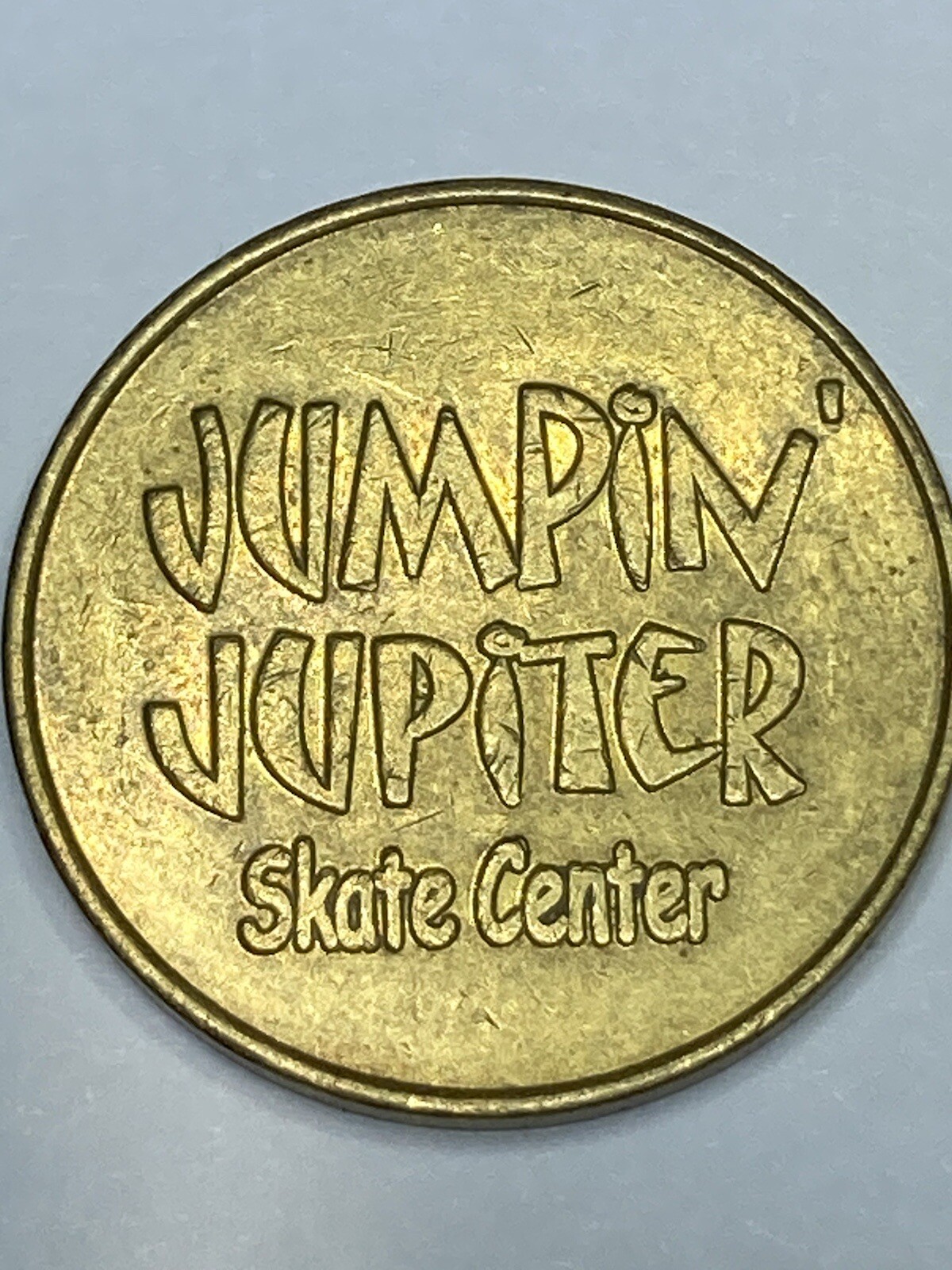 RARE JUMPIN JUPITER SKATE CENTER ARCADE TOKEN - Muskegon, MI - Obsolete (#p04)