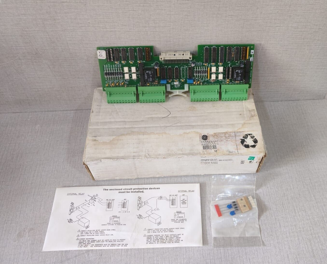 GE 2RP Reader Interface Unsupervised DI Board 110063001 - NEW W/ FILTHY BOX