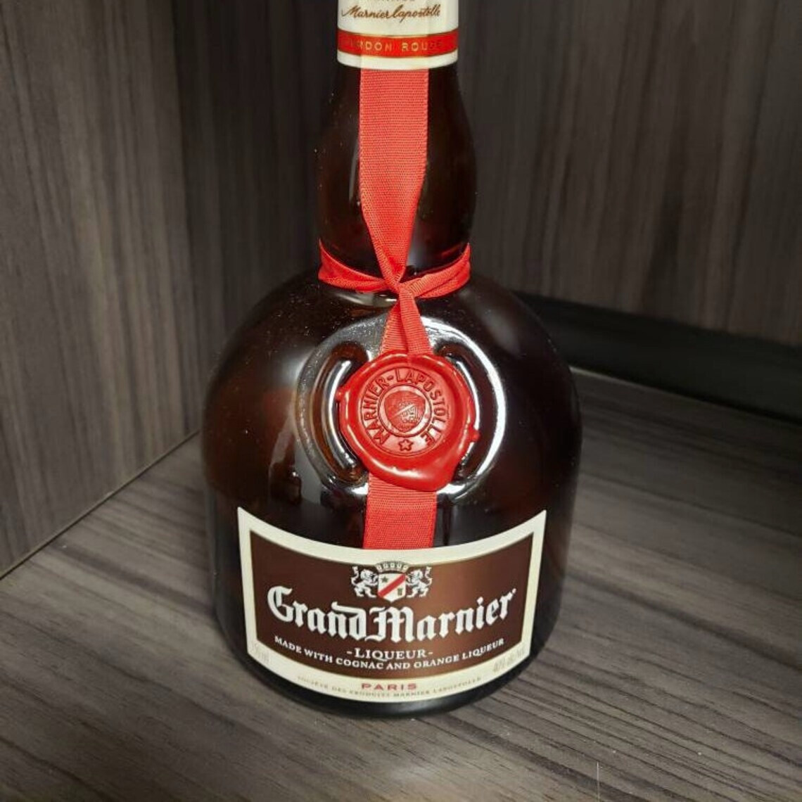 Empty Grand Marnier 750 ml bottle with top and wax seal