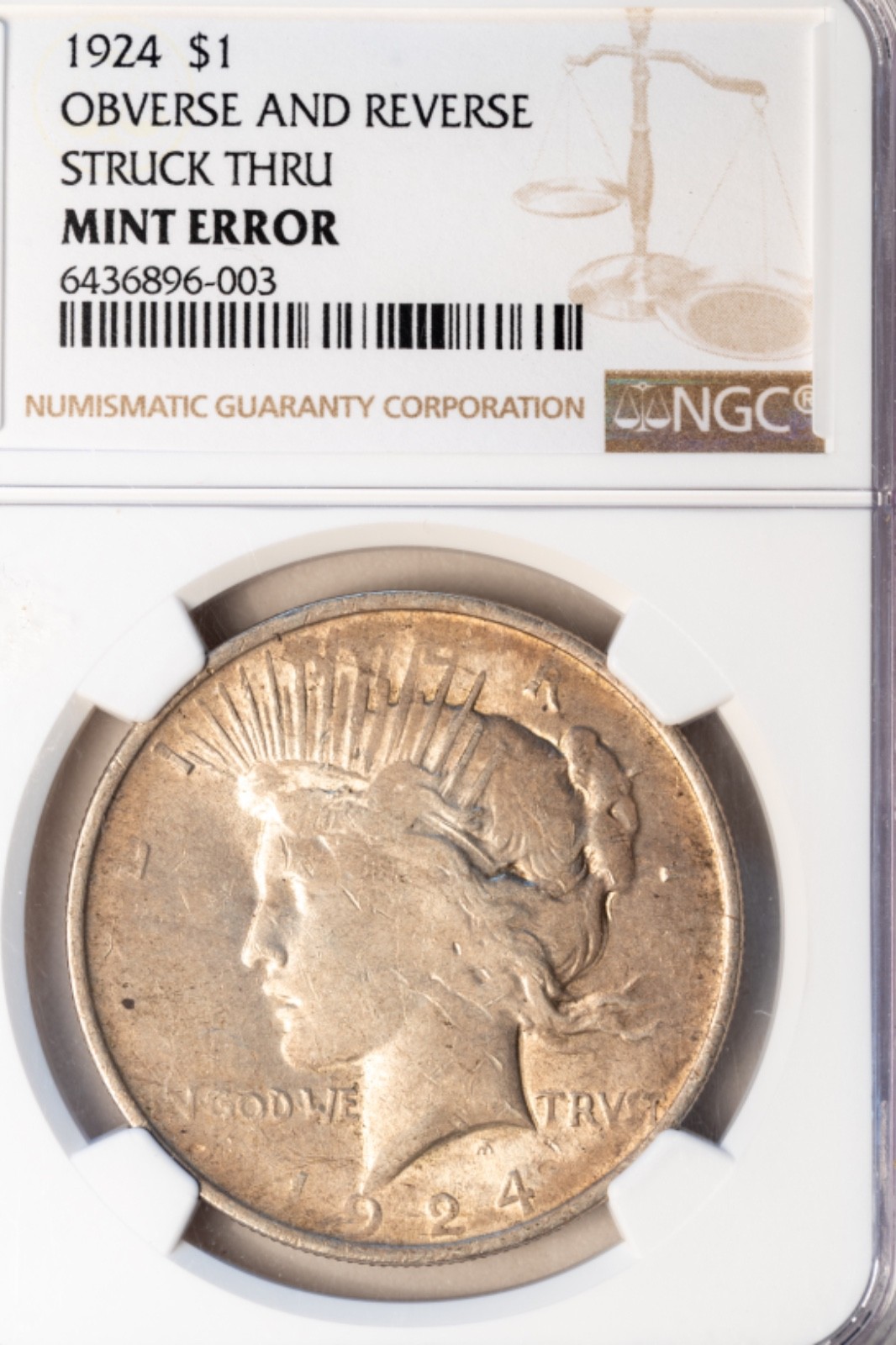 1924 Peace Dollar Mint Error Struck Through NGC Certified