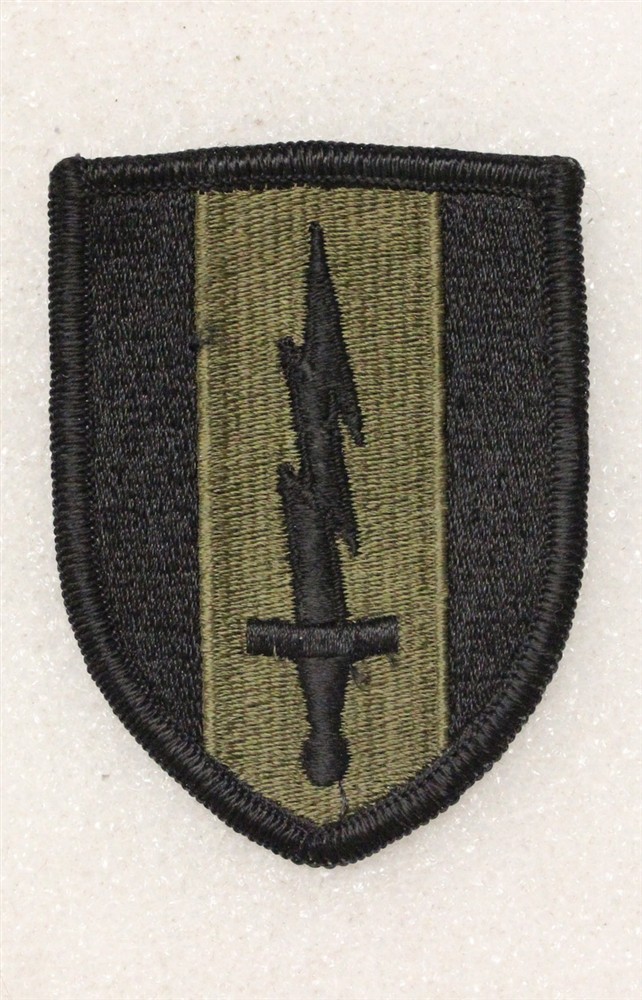 Army Patch: 1st Signal Brigade - subdued, merrowed edge