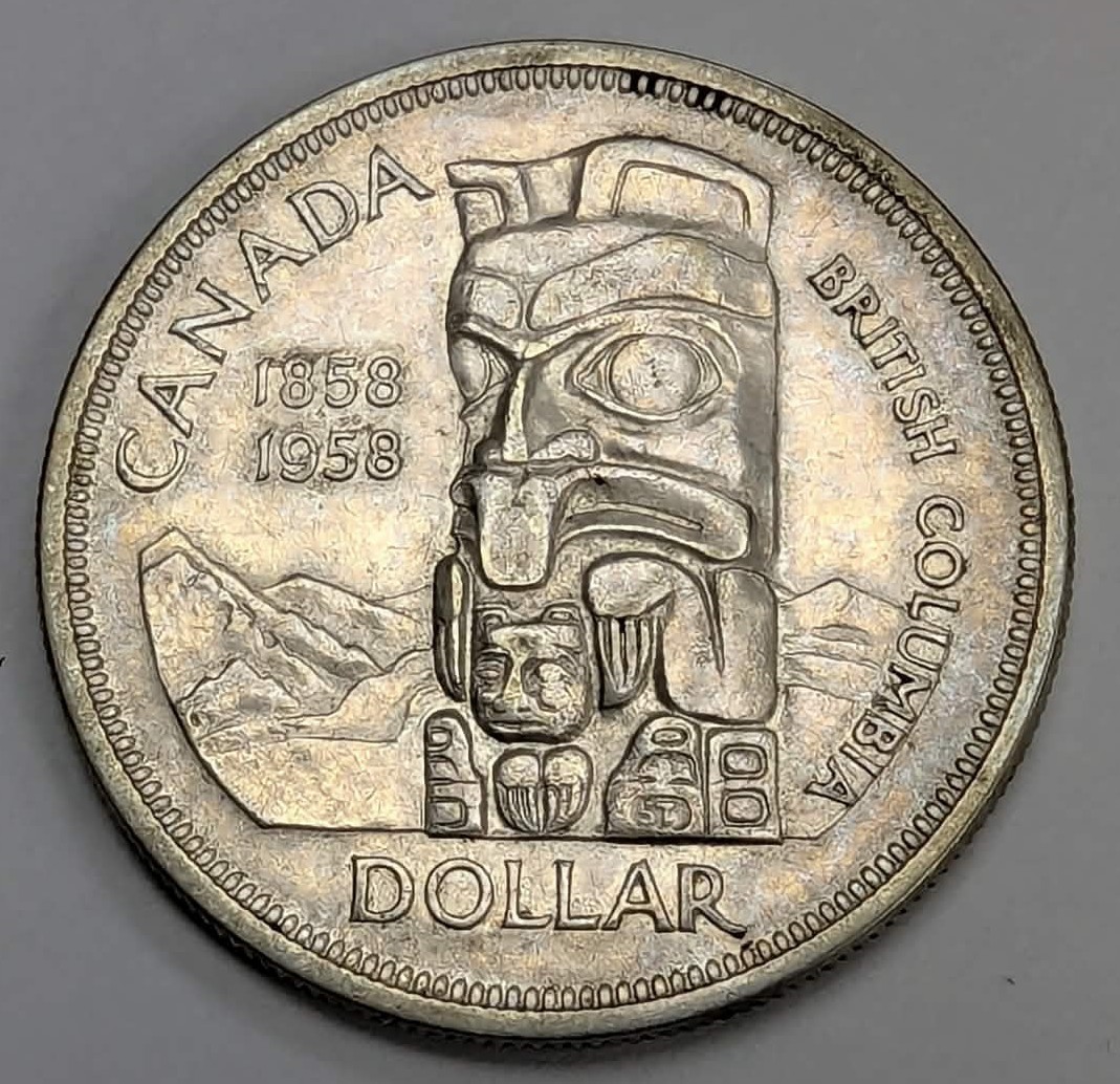 1958 Canadian Totem Pole Silver Dollar