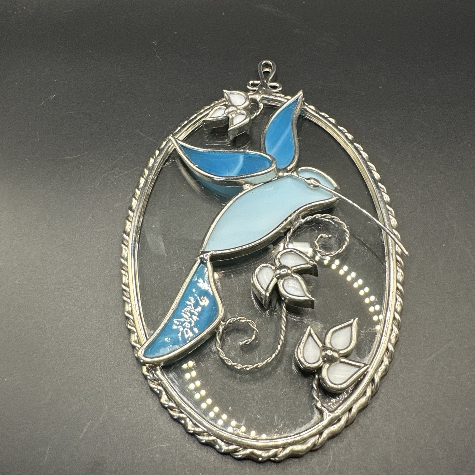 blue glass hummingbird suncatcher On Clear Glass Oval Background 6x4”