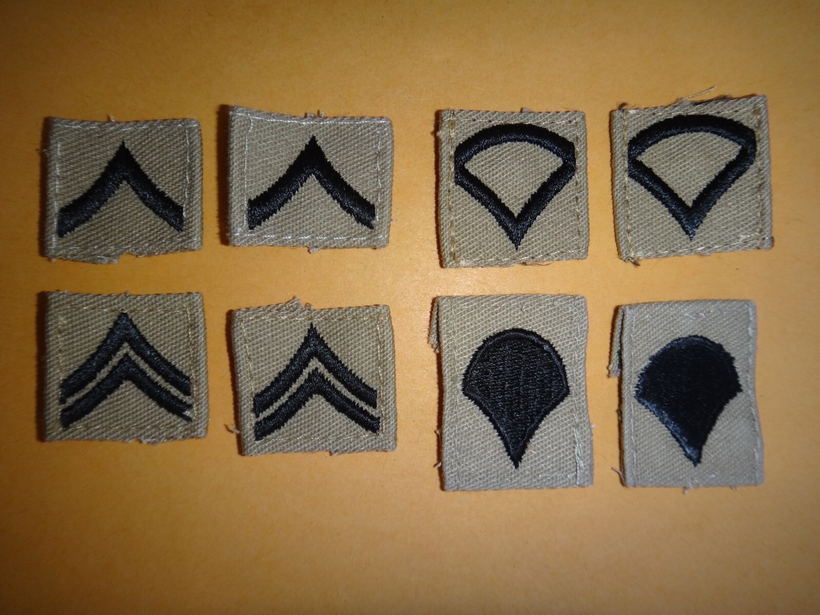 Group Of 4 Pairs Of US Army Various Enlisted Rank Desert Tan Collar Patches