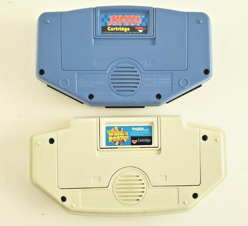 Lot of 2 Electronic Handheld Games Jeopardy & Wheel of Fortune Instruction WORKS