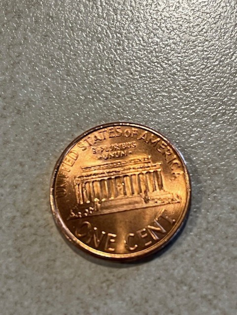 1994 D mint penny with errors
