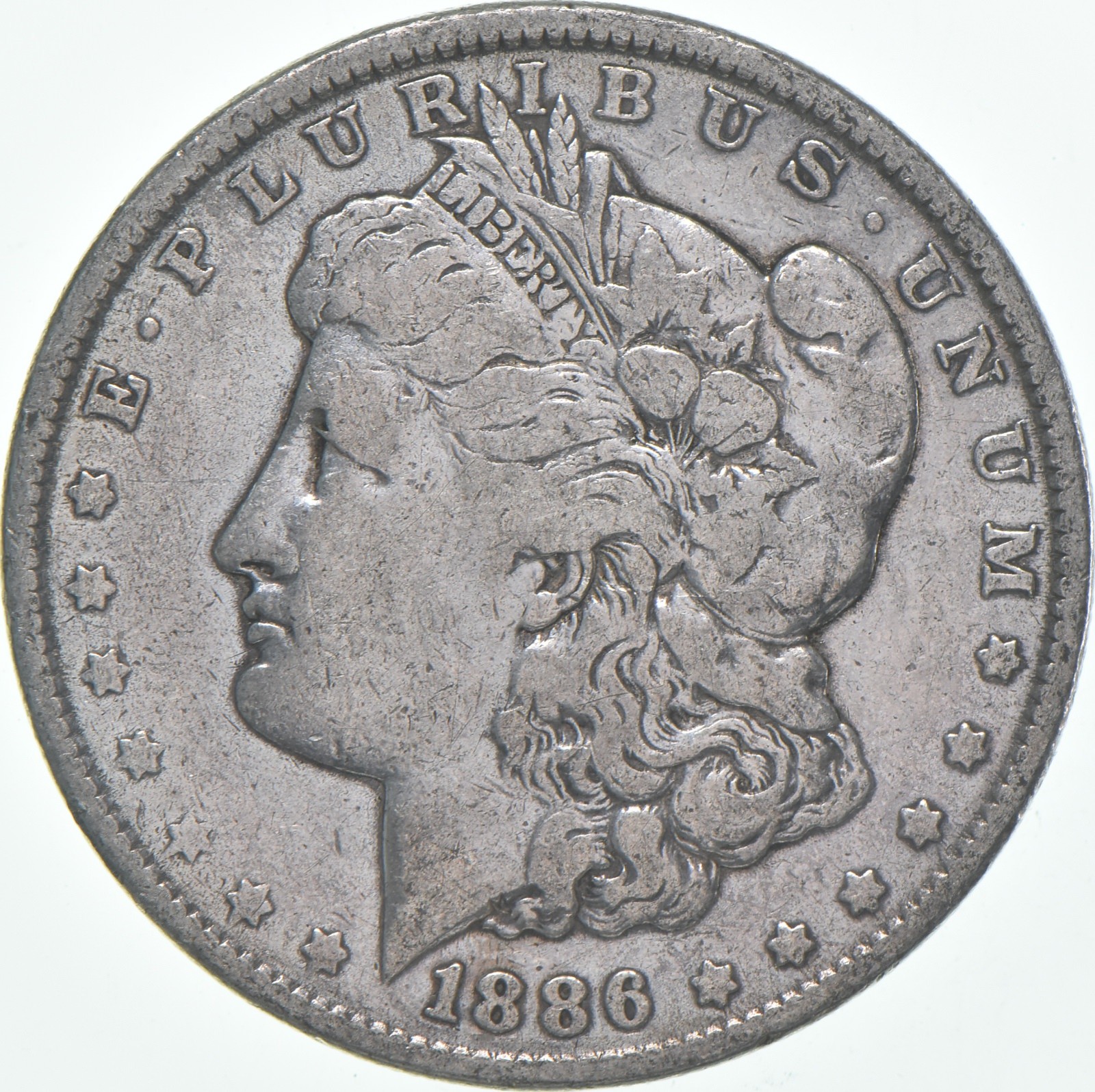 VG/F 1886 (P) Morgan Silver Dollar (1 coin)