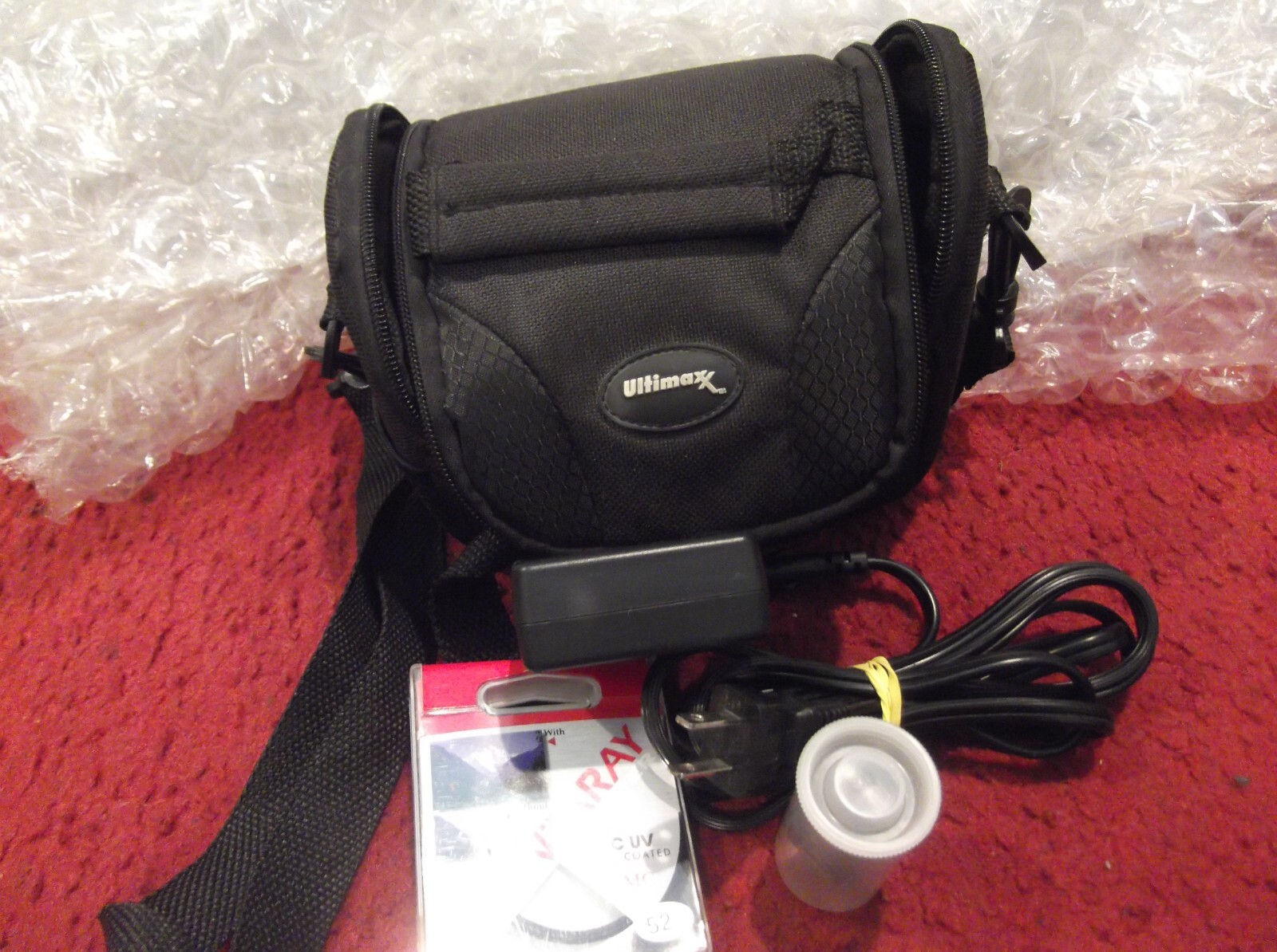 Lot - Accessories Nikon Charger, MC UV Filter, Camera Bag And Others