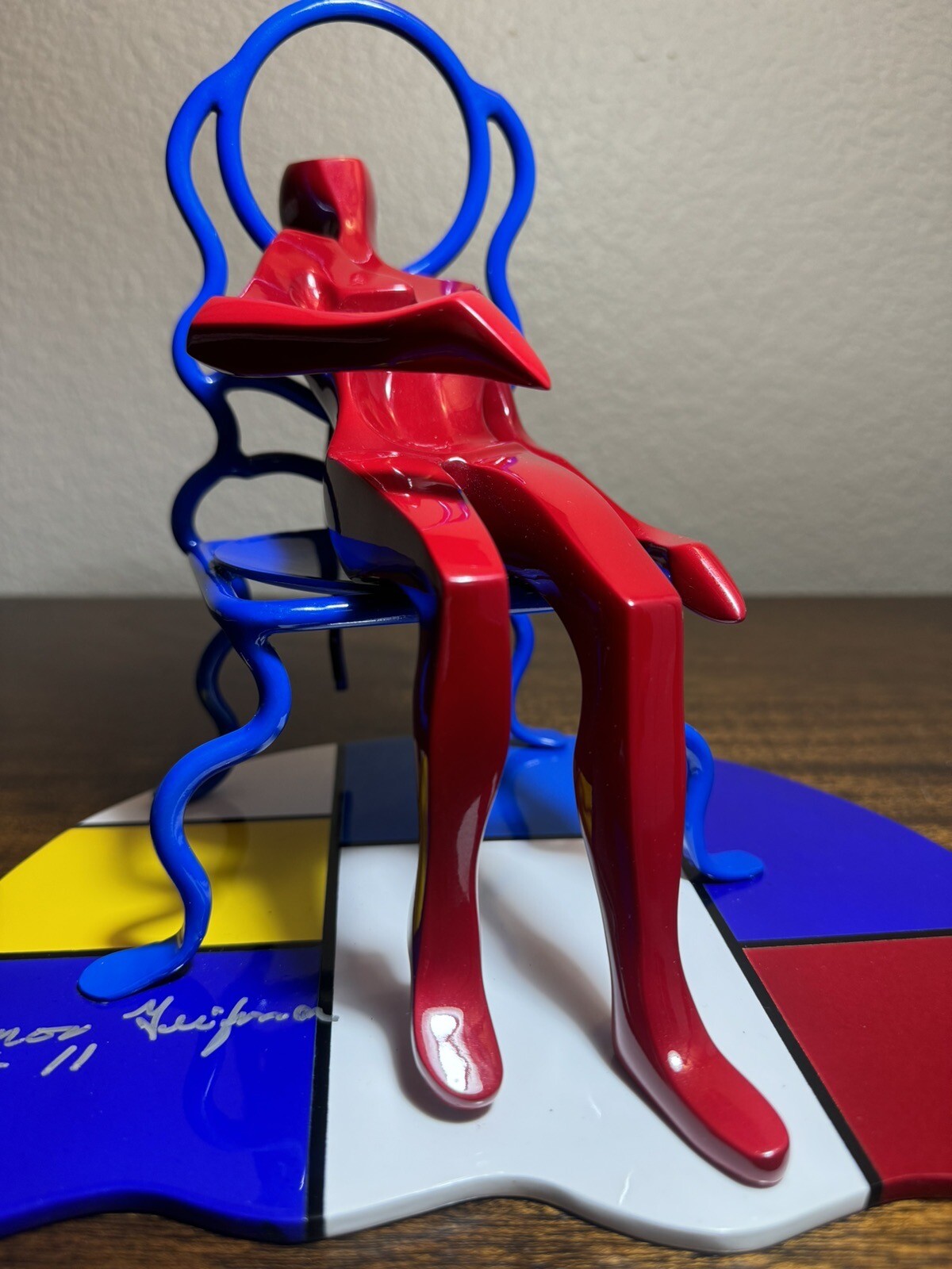 Sitting on Chair Bronze Sculpture By Amor Geifman