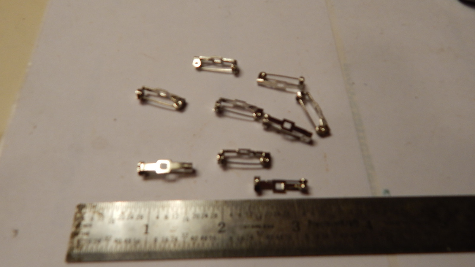 12 VINTAGE NEW SILVER PLATE PIN BACK ASSEMBLY FINDINGS