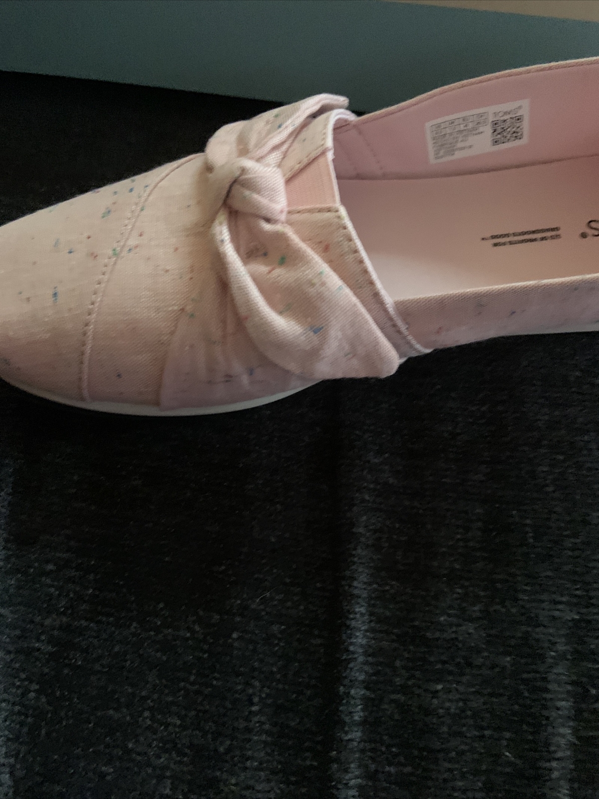 toms ladies chalky pink speckled lined/bow slip on size 9.5