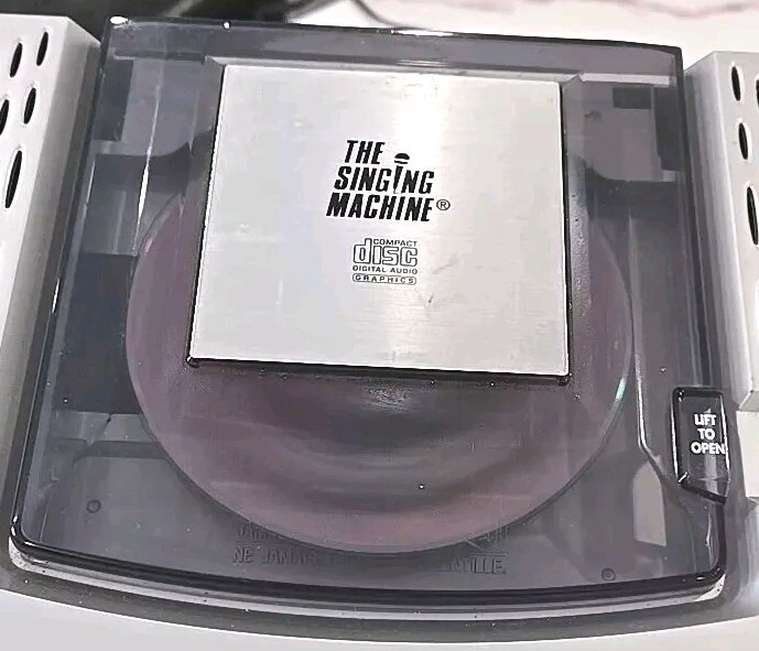 The Singing Machine Compact Disc Digital Audio Graphics With Microphone
