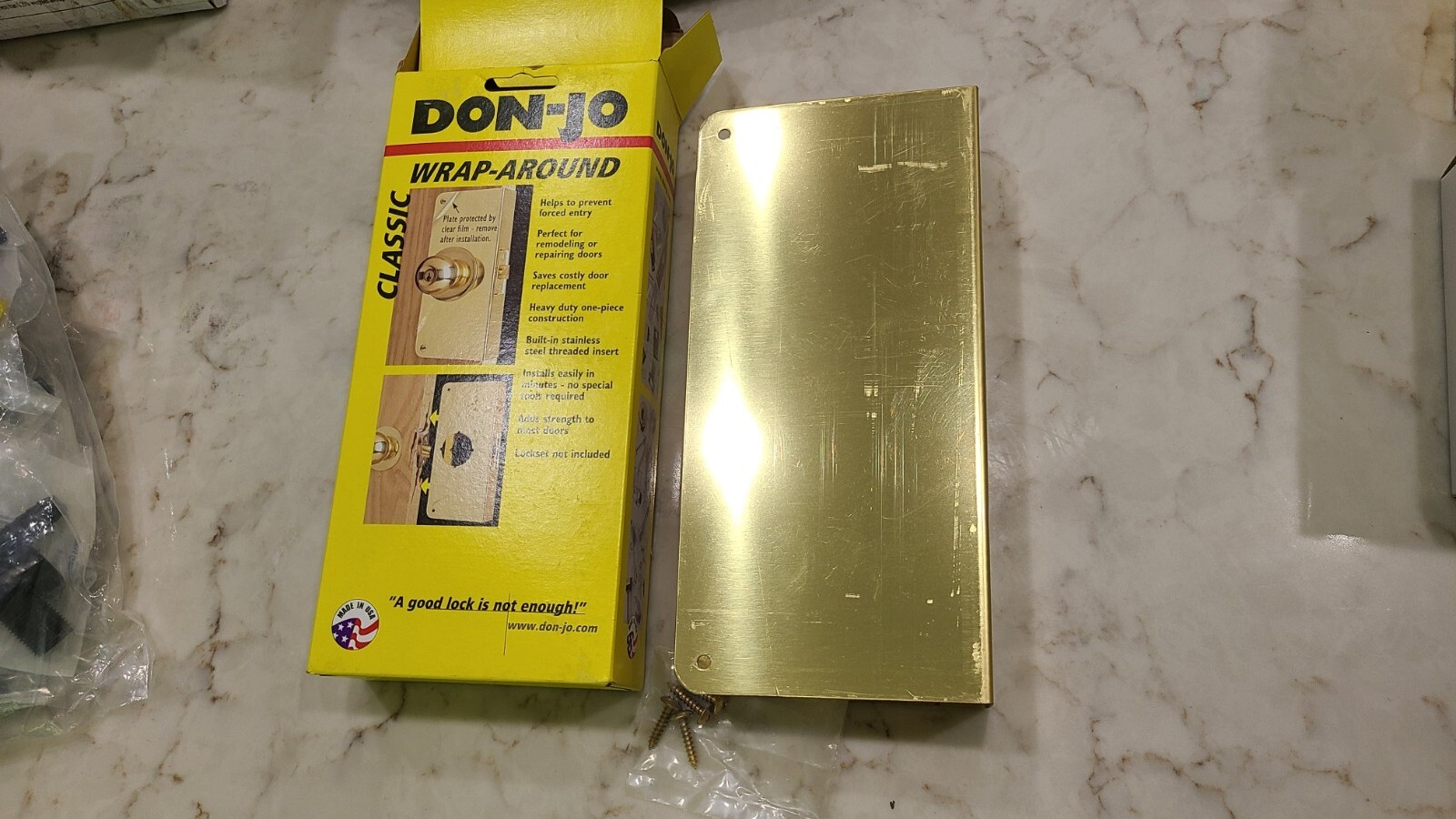 Don-Jo 40-PB-CW wrap around 9"x 4 1/4"x 1 3/4" brass colored solid plate