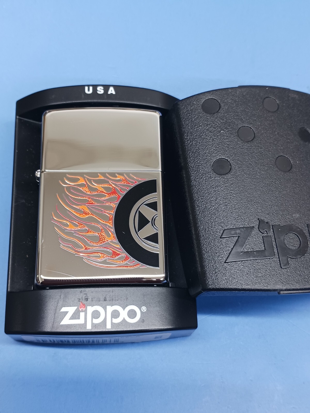 Zippo Burning Rubber High Polish Chrome 24036 (Slight Scratch on left corner)