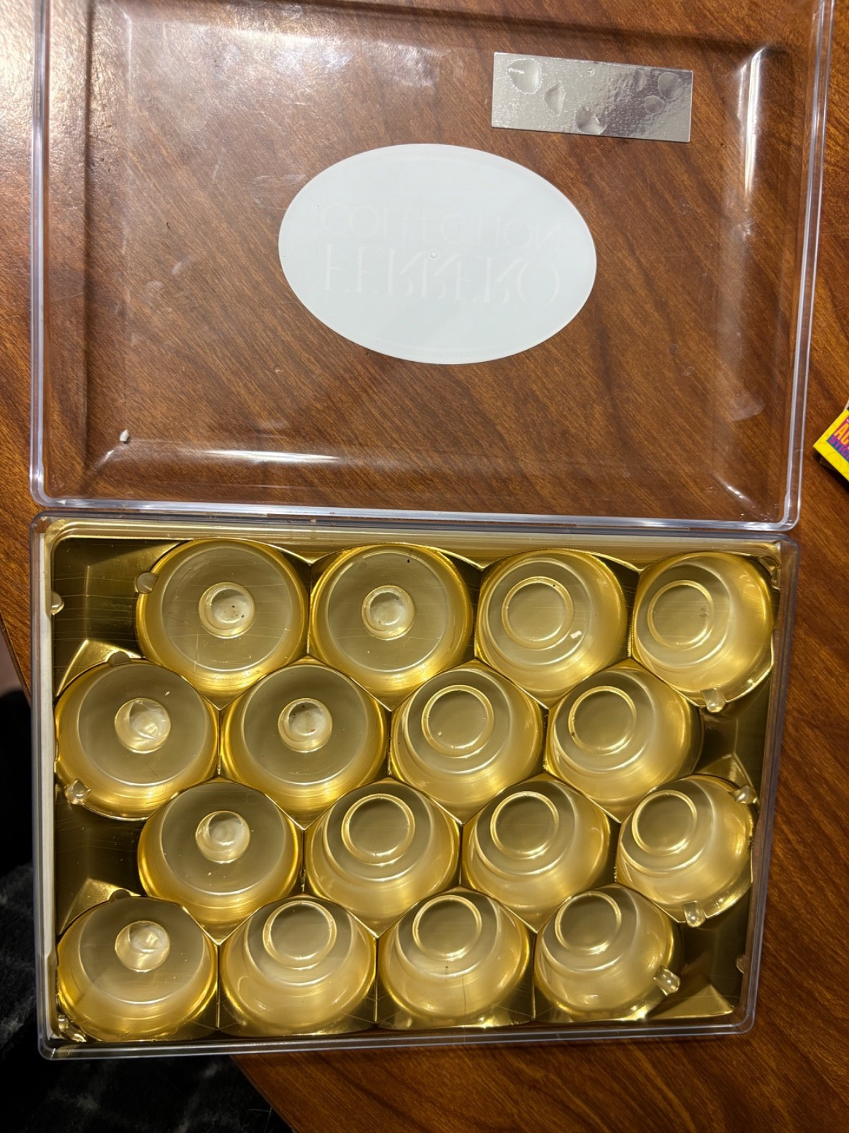 empty Ferrero collection plastic container