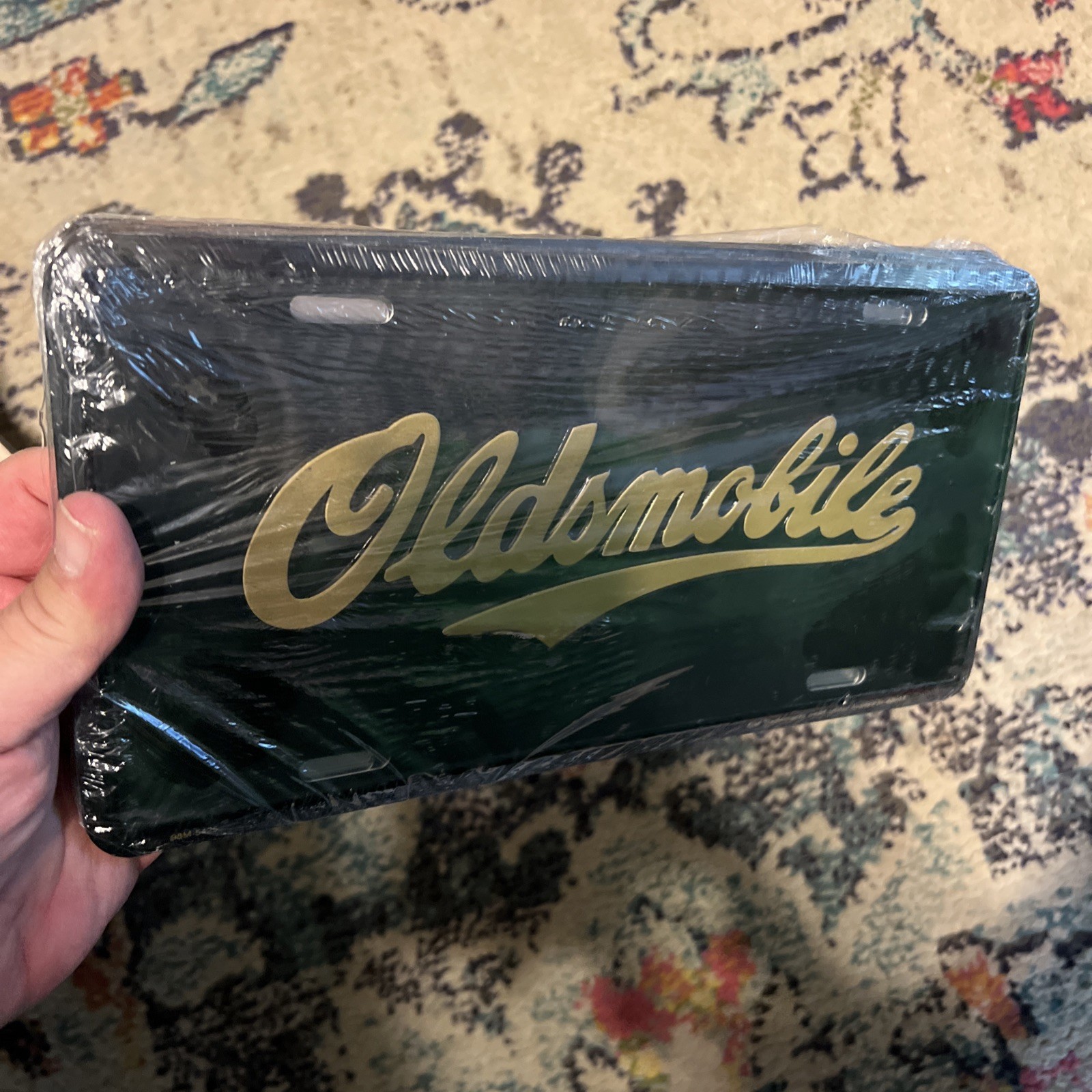 Vintage Oldsmobile Booster License Plate Sealed
