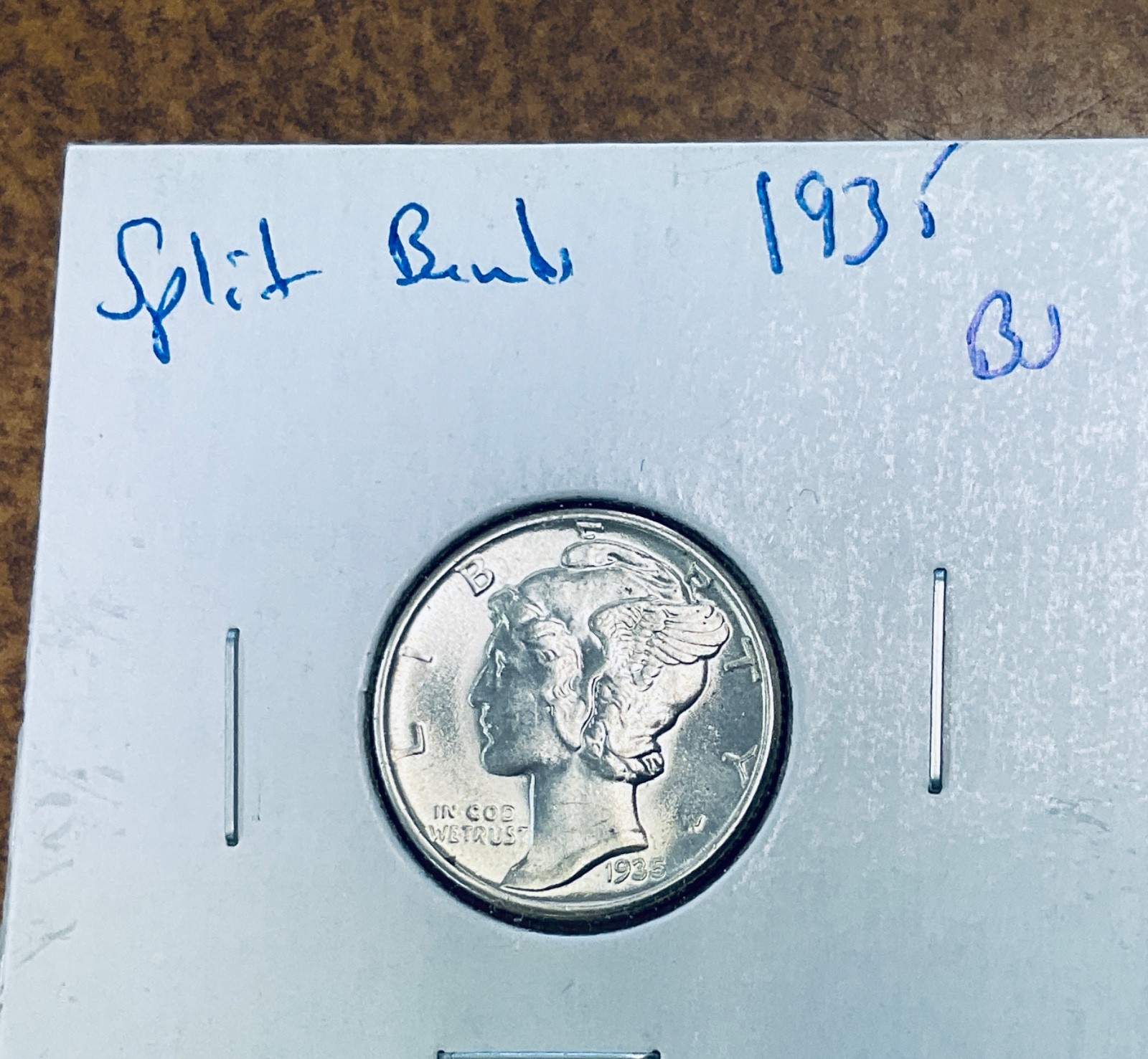 1935 P , 1 BU Mercury dime, as shown nice BU, .split bands.