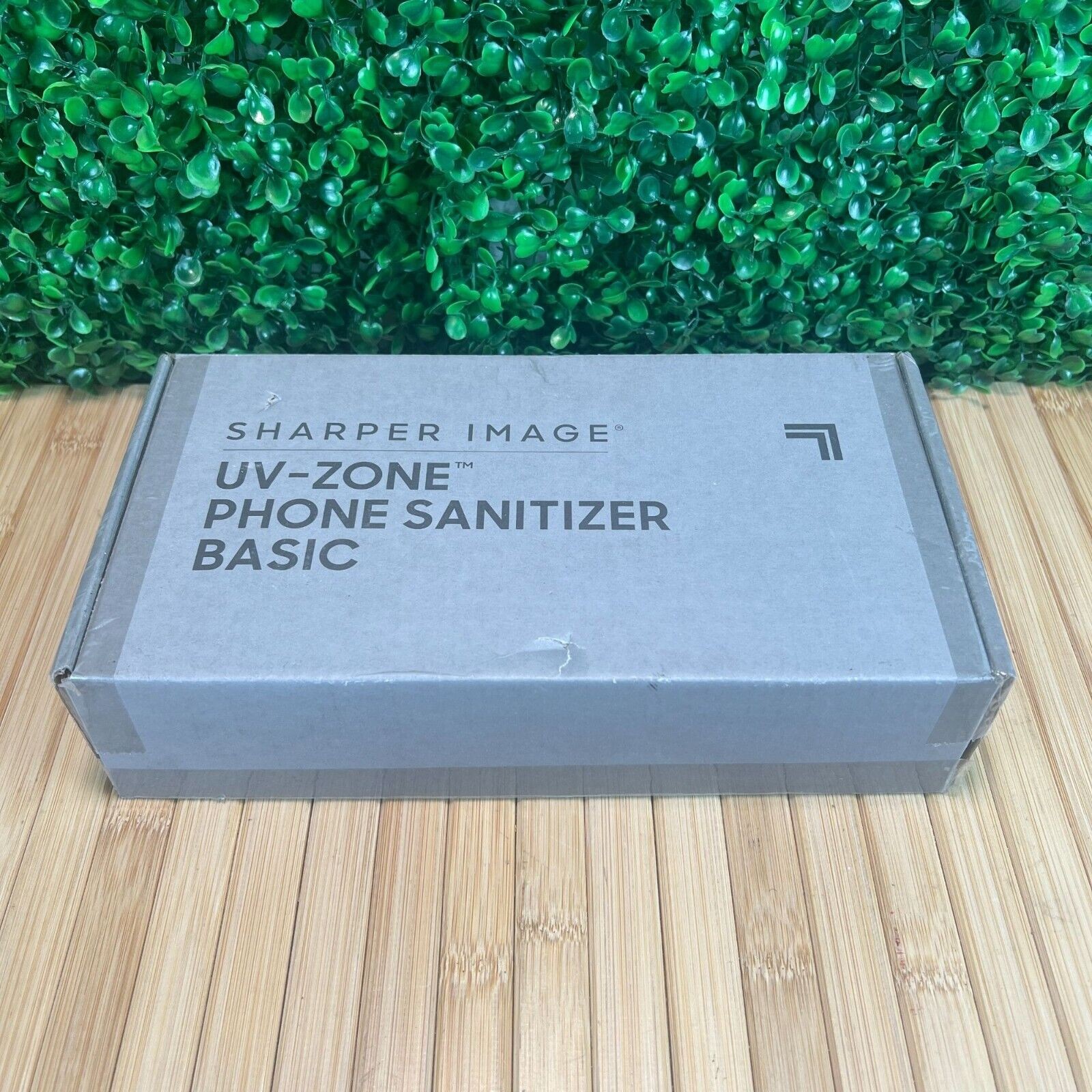 NIB Sharper Image UV-Zone Phone Ear Phones Sanitizer White