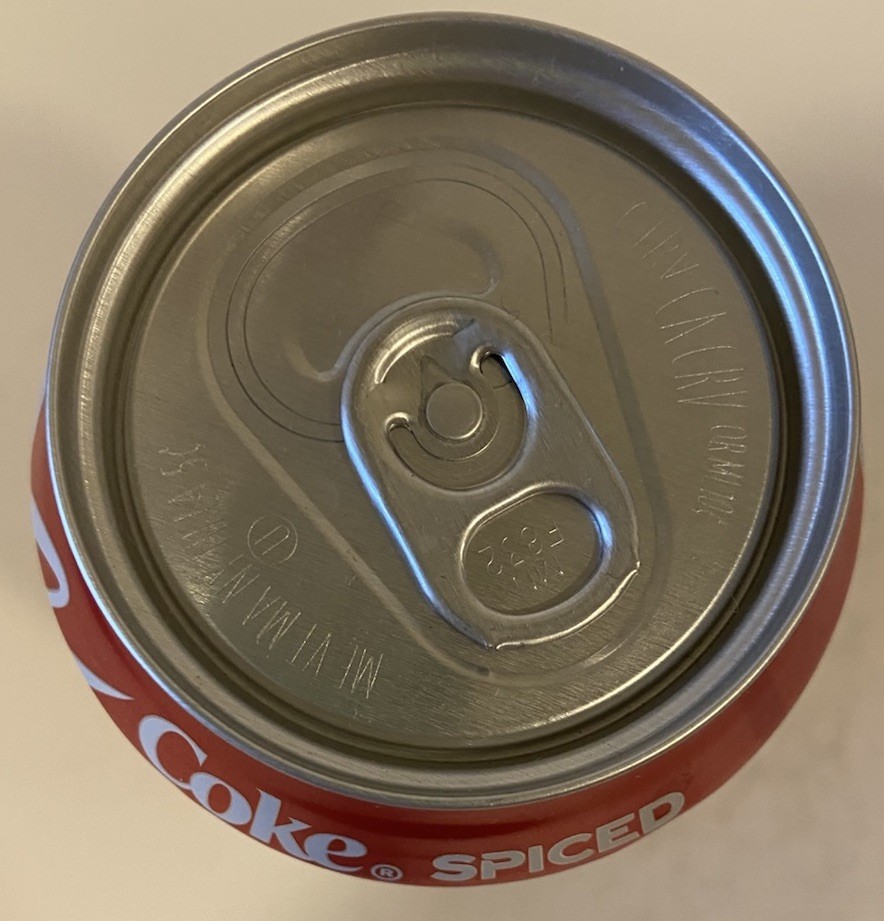 12 oz. COKE SODA CAN ( SPICED )EMPTY BOTTOM OPENED