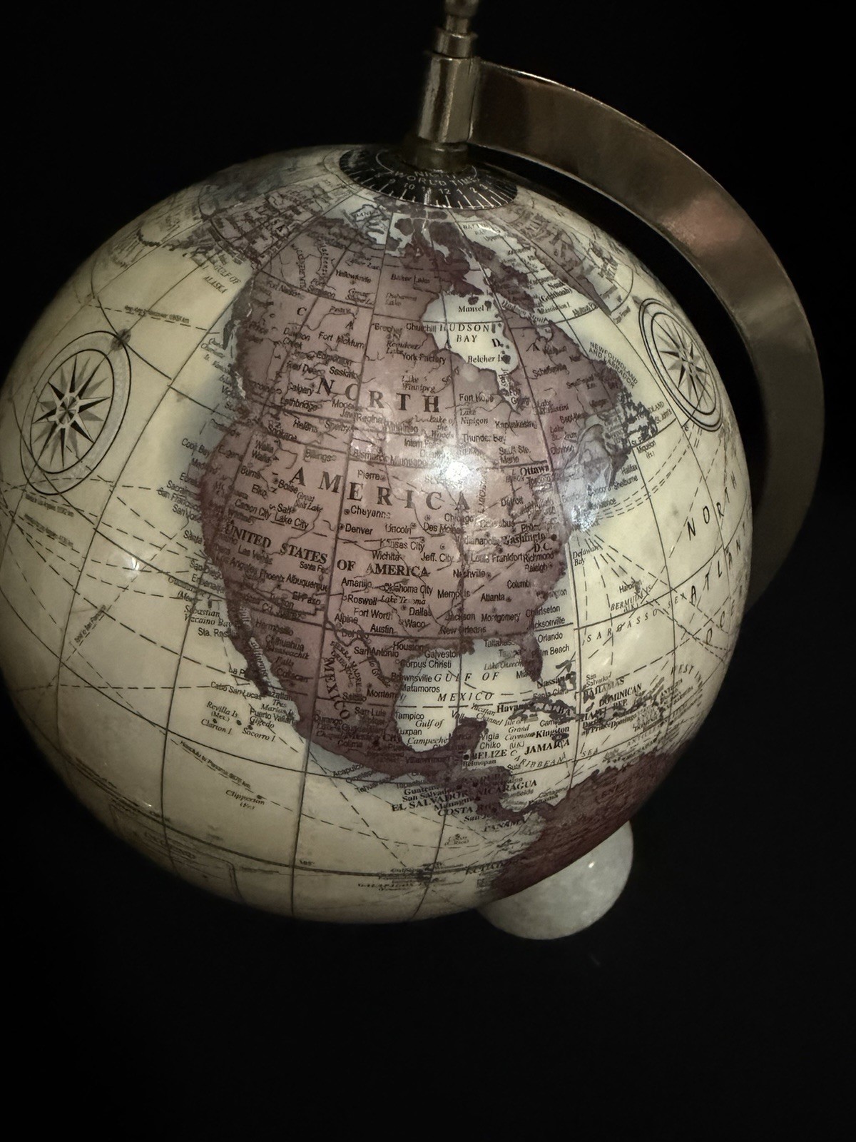 Small decorative table globe with white marble base